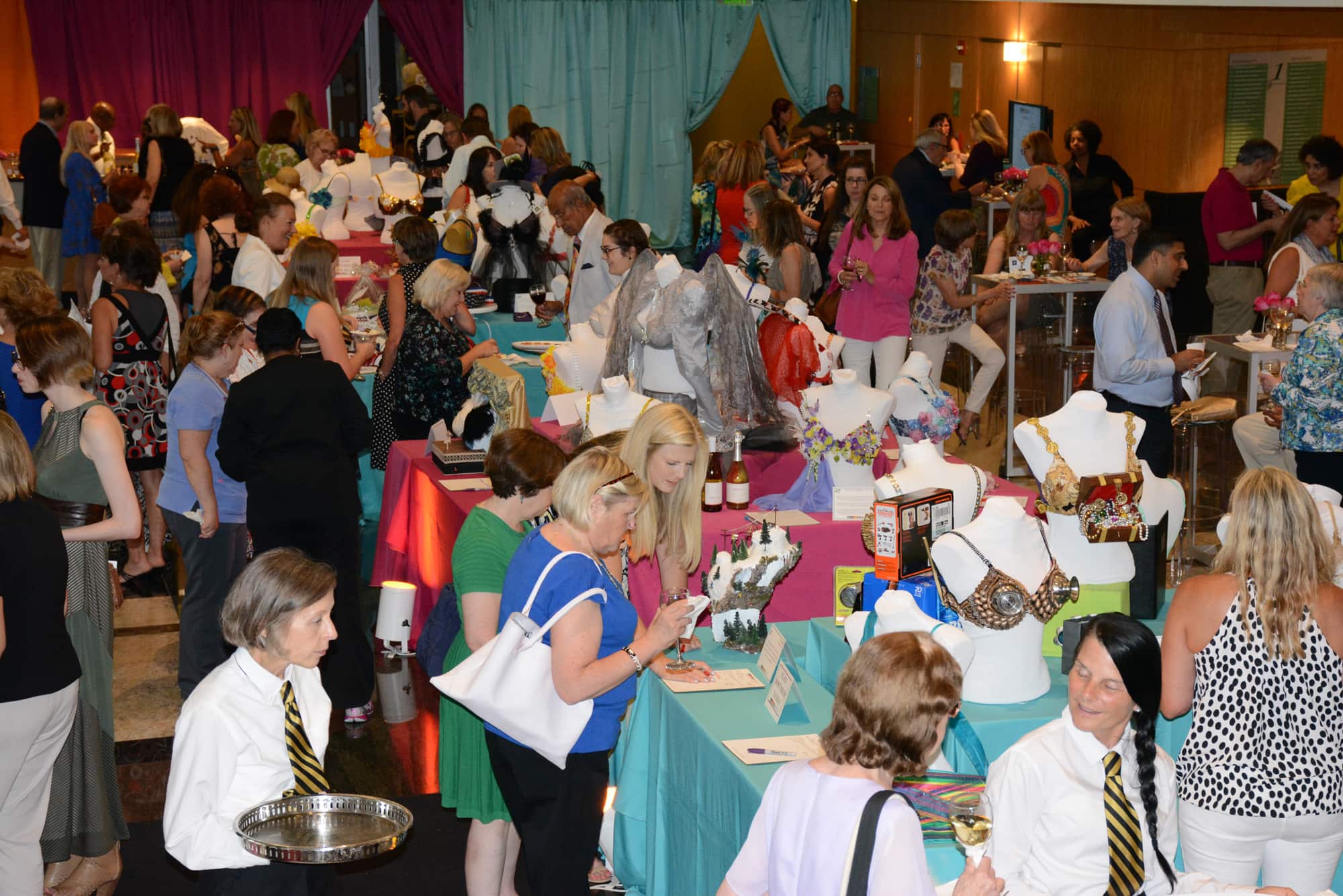 Guests gathered in the lobby of The Weinberg Center at Mercy for BRAnanza.