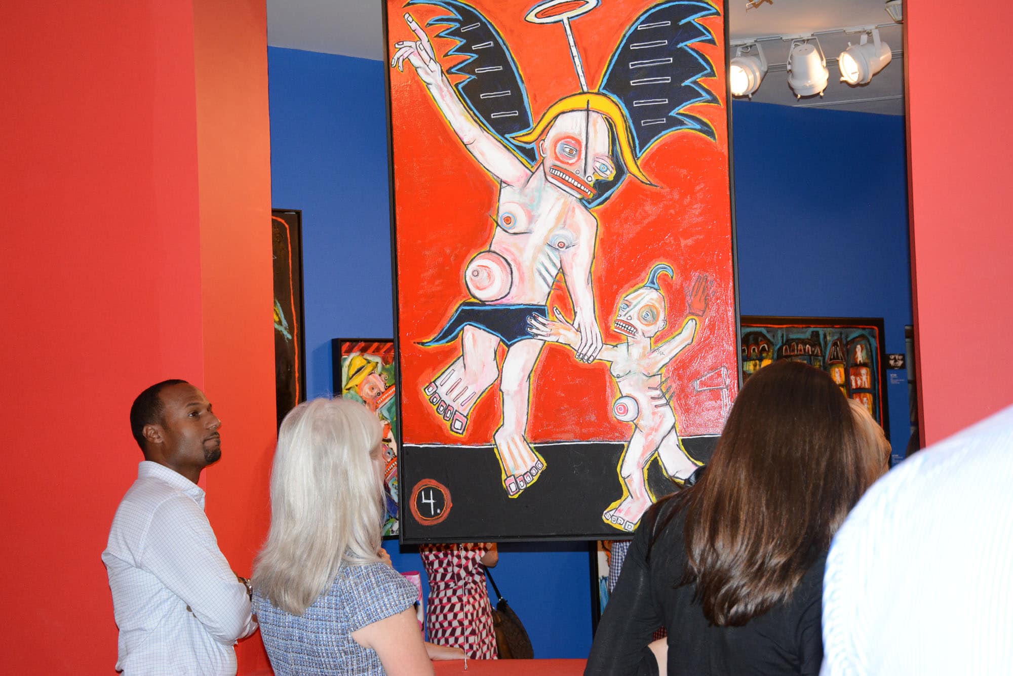 First folks toured the museum, specifically the "Shock and Awe" exhibit, where they could chat with its artist, Matt Sesow.