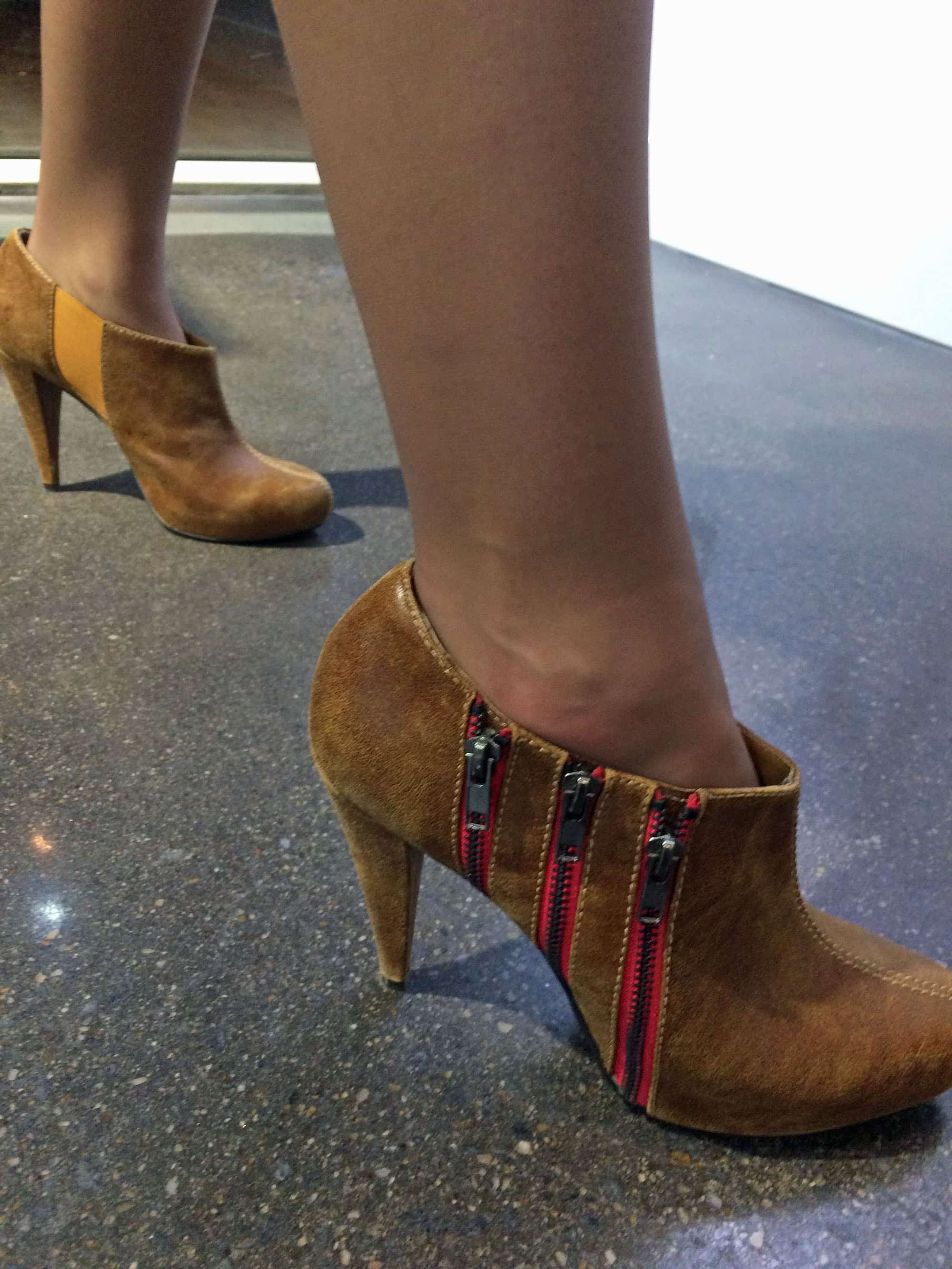 Also wearing Steve Madden shoes was Katie Caljean – tan suede booties with three bright red zippers.